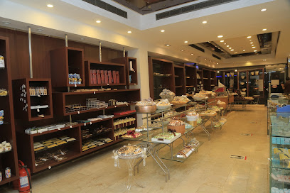 حلويات شوكولاين - الجموم -